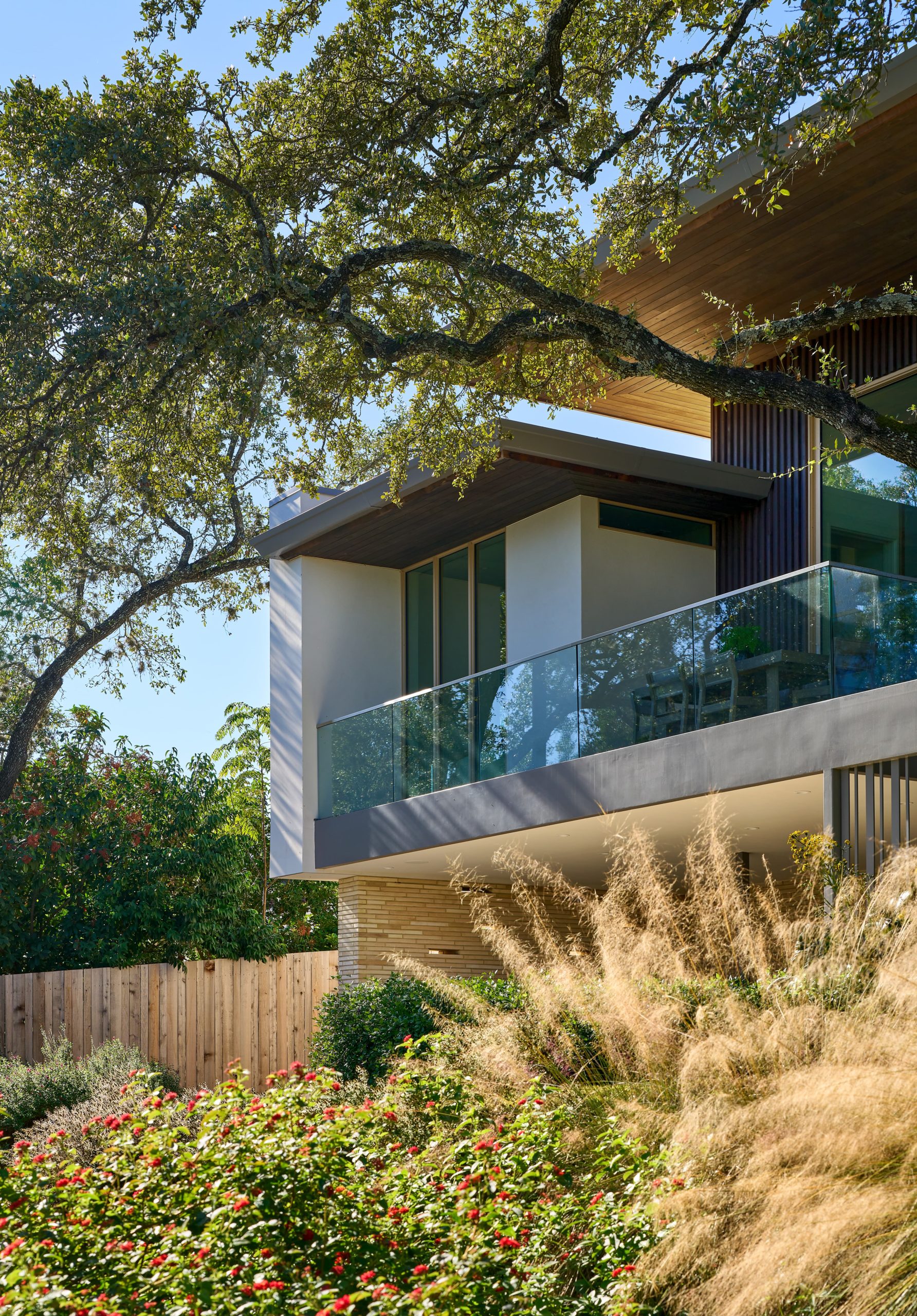 View of Backyard Balcony at Crestway Residence by Jay Corder Architect