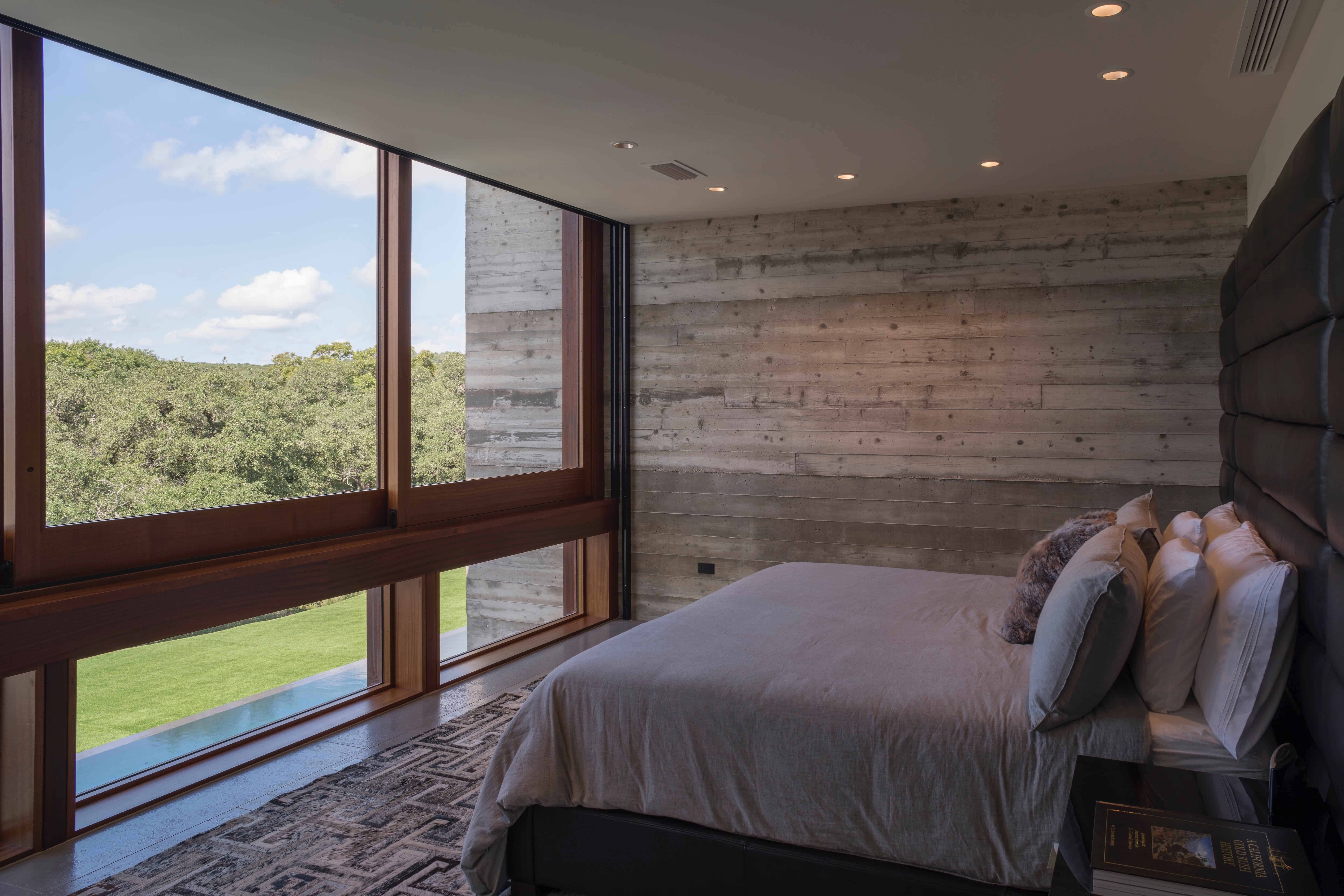 Master Bedroom with large picture window overlooking Texas Hill Country