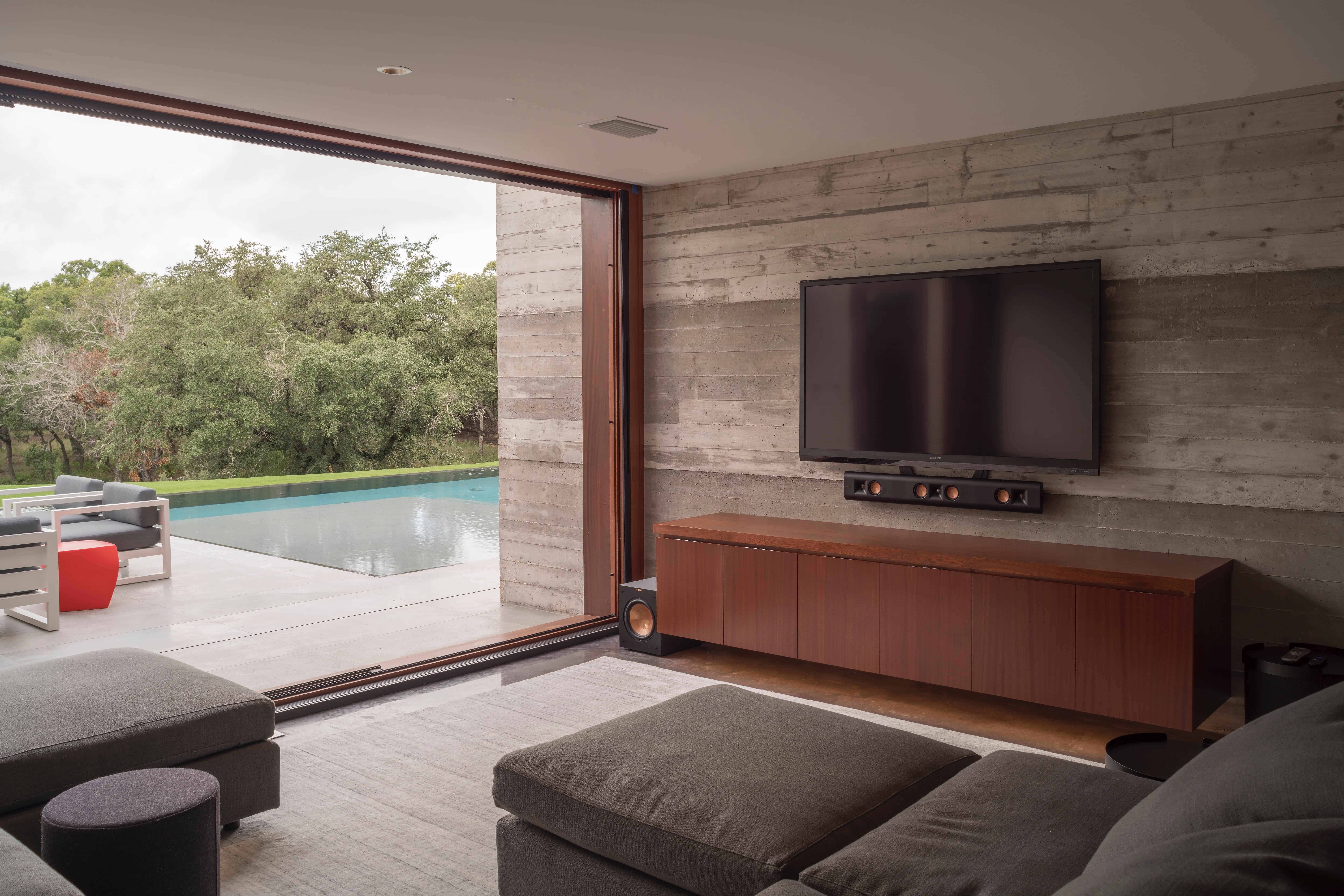 Large Picture Glass Window overlooking modern pool